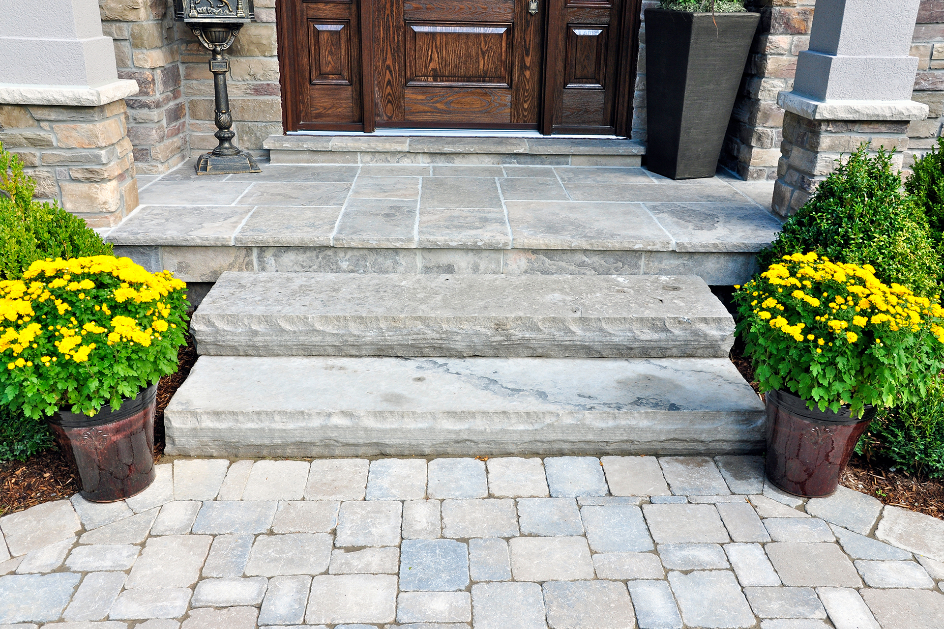 Outdoor living space with pavers and seating area