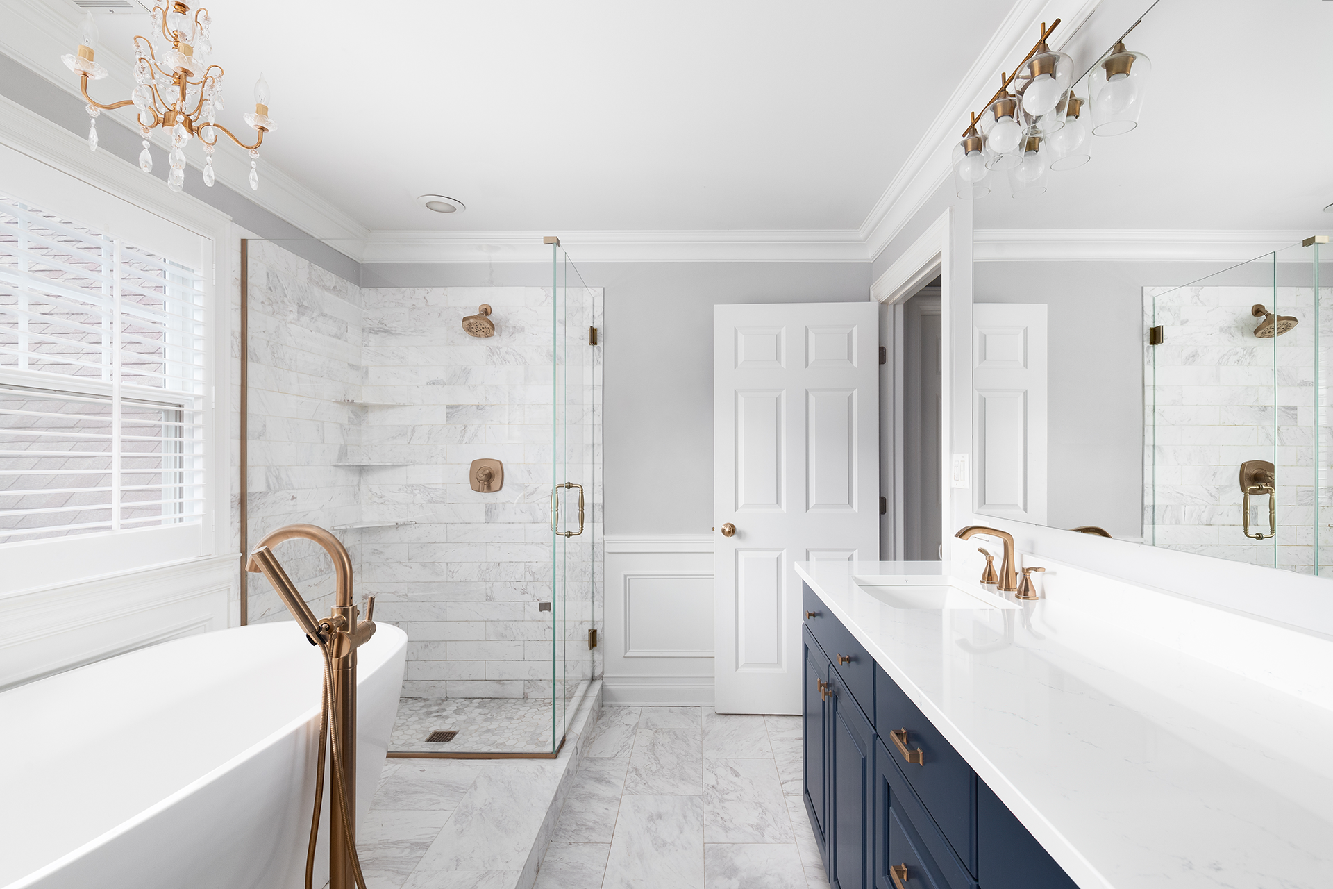 Modern vanity with LED mirrors and tile flooring