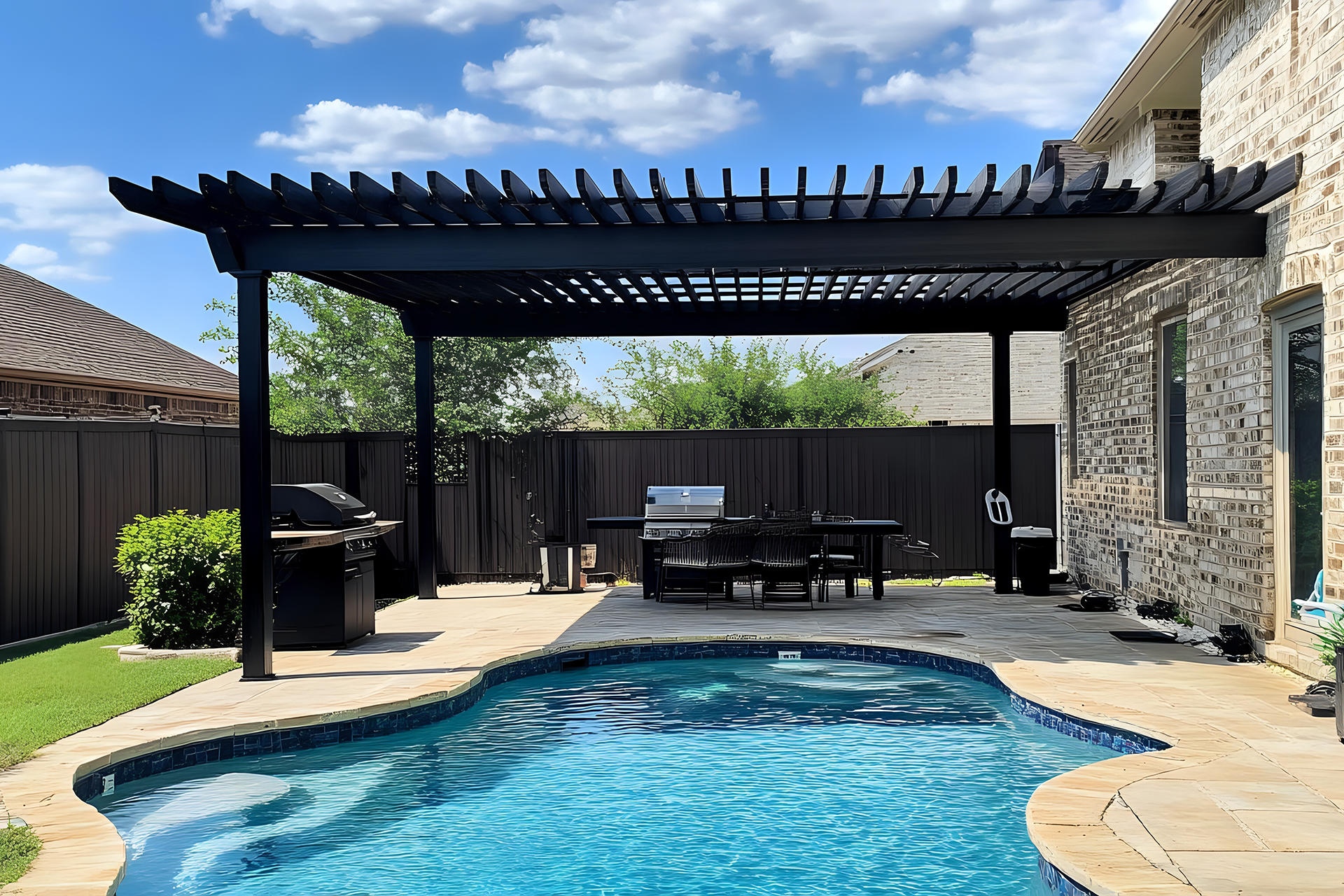 Modern backyard with artificial turf and decorative stone edging