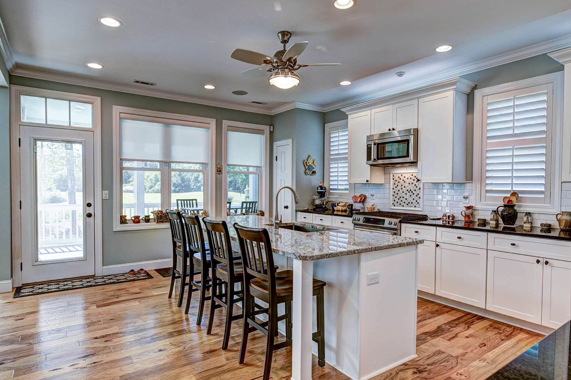 Custom cabinetry and stainless steel appliances in remodeled kitchen