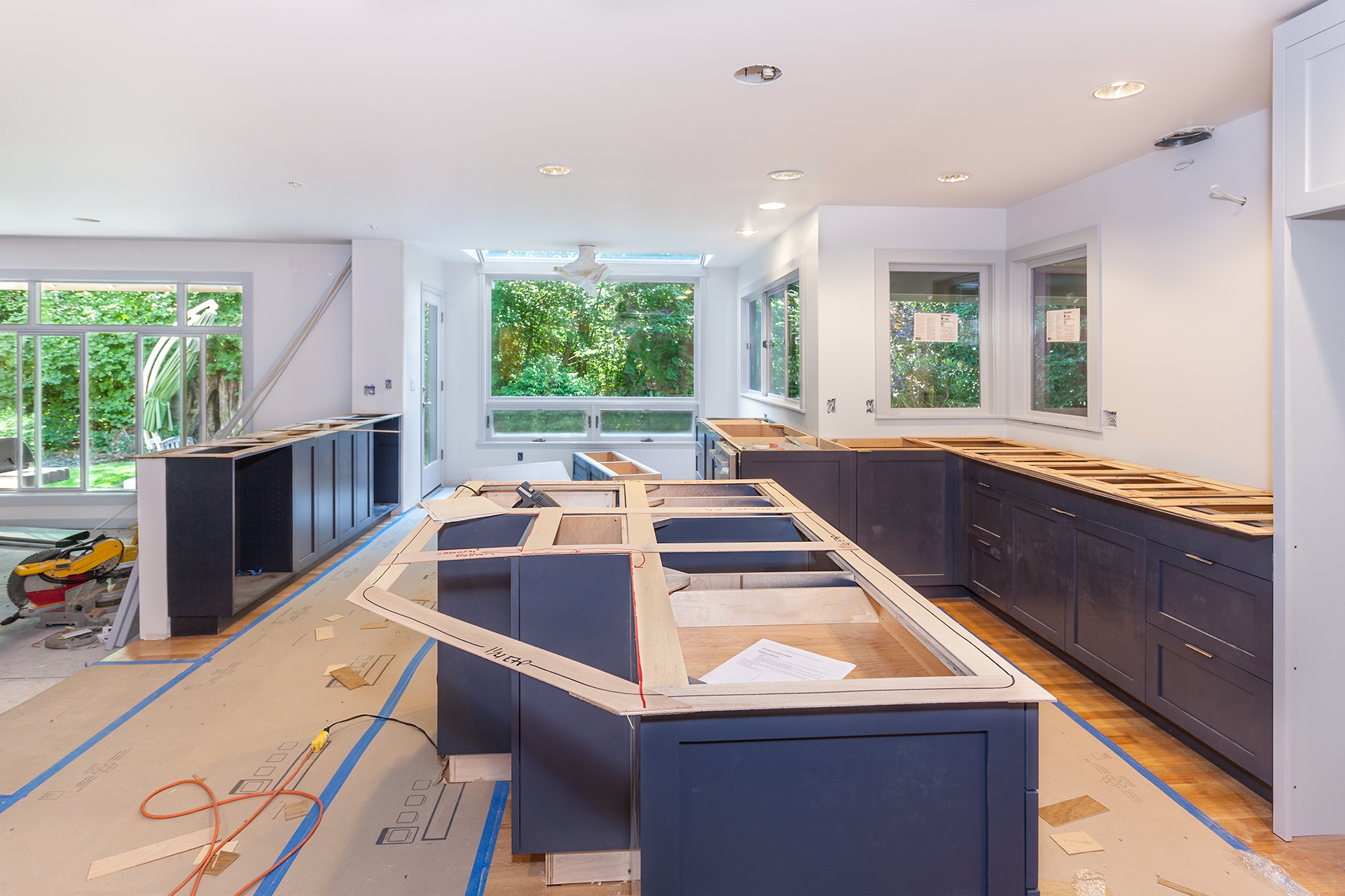 Open concept kitchen with dining area and large island