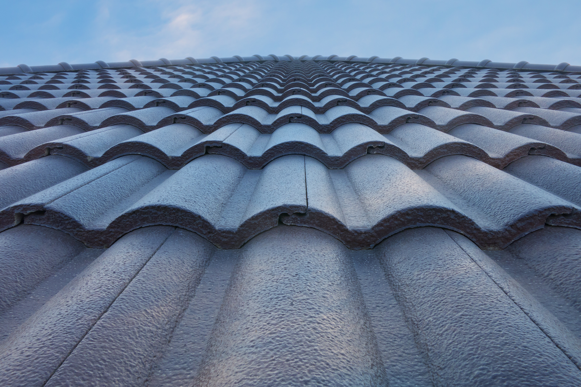 Roof shingles being installed on home